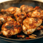 A sizzling plate of Kickin' Chicken, grilled to perfection with a smoky, golden-brown crust.