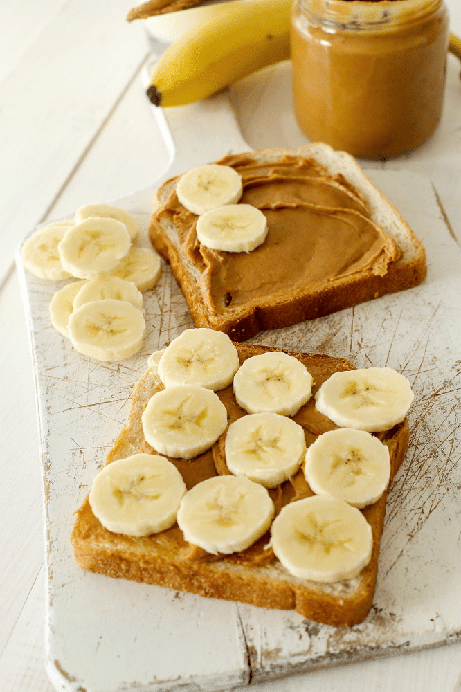 A delicious slice of toast topped with creamy peanut butter and freshly sliced bananas