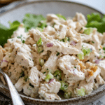 A bowl of Plain Chicken Salad made with shredded chicken, creamy mayonnaise.