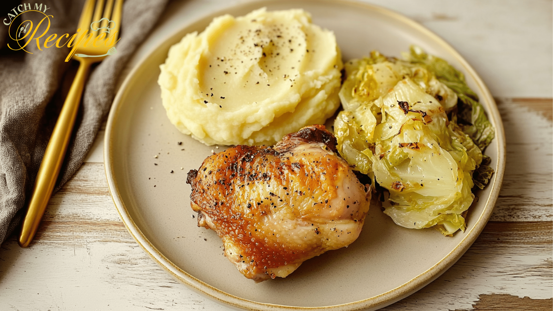 chicken thigh and cabbage recipe with mashed potatoes garnished with black pepper